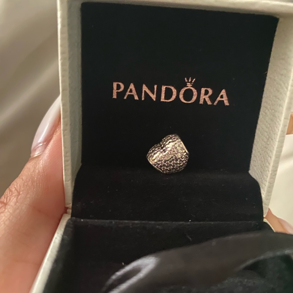 Pandora heart charm filled with pink diamonds